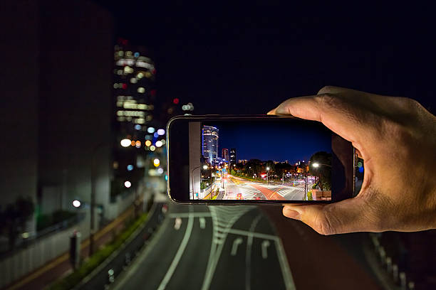 istock Shooting the city lights with a mobile device 639450570