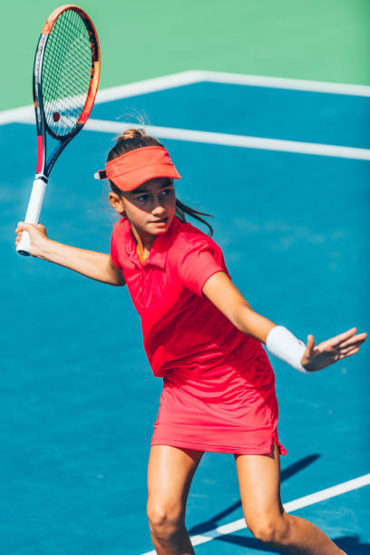 istock Junior tennis player in action 639454566