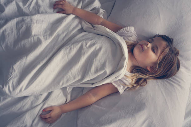 istock Cute little girl in bed. 639454826