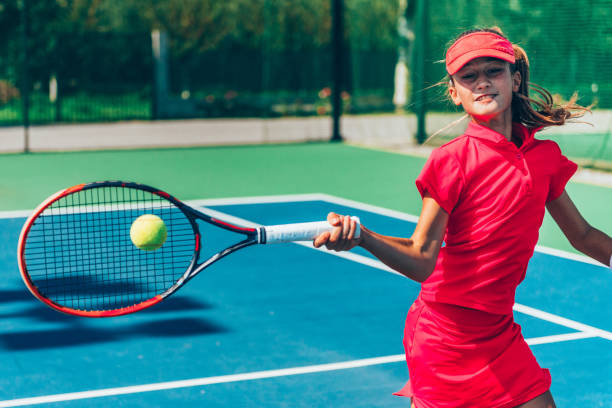 istock Girl playing tennis 639455044