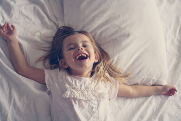 istock Cute little girl in bed. 639455236