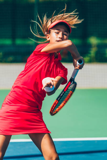 istock Girl playing tennis 639456012
