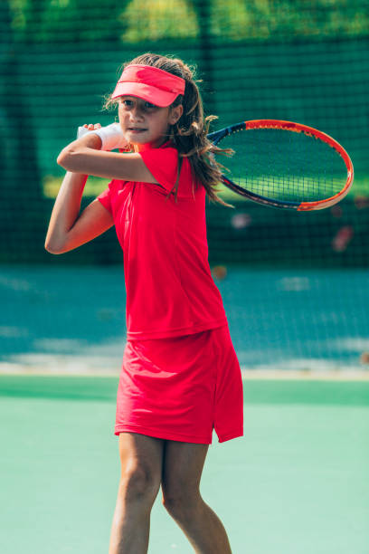 istock Girl playing tennis 639456110