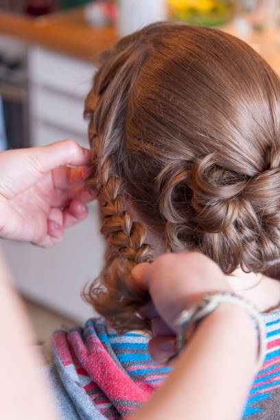 Bride is at the hairdresser Bride is at the hairdresser hochsteckfrisur stock pictures, royalty-free photos & images