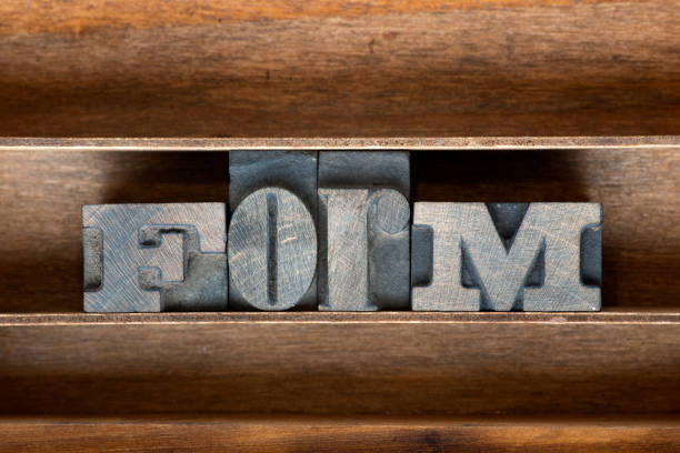 form word made from vintage letterpress type on wooden tray