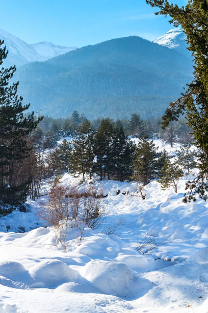 istock Winter lansdcape with mountain peaks view and snow valley 639457192