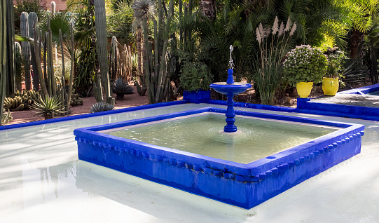 Blue Fountain in garden in Marrakesh , Morocco