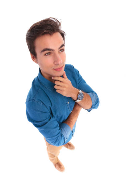 istock side view of a young casual thinking 639462776