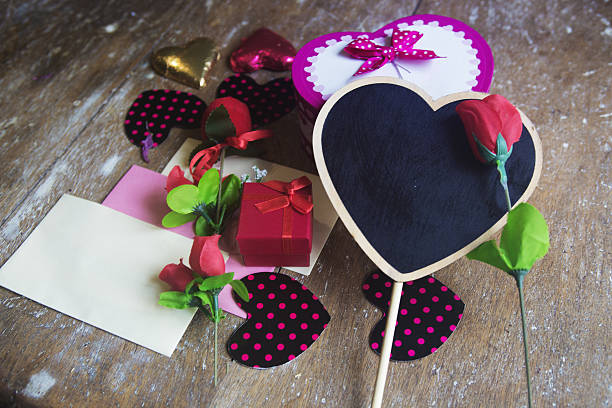 Birthday gift with hearts and notes