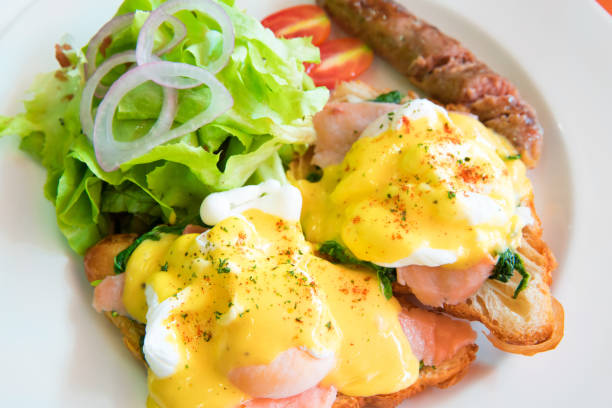 istock Egg benedict with smoked salmon, sauce, and grill hot dog 639464926