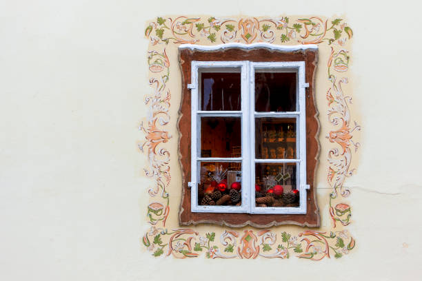 Old Window on Cracked Wall with Christmas Decoration and Copy Space