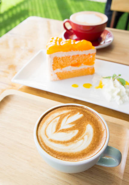 istock coffee cup and Delicious cake in coffee shop 639468054