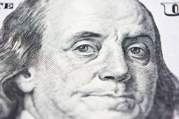 istock Benjamin Franklin face on us 100 dollar bill extreme macro 639469092