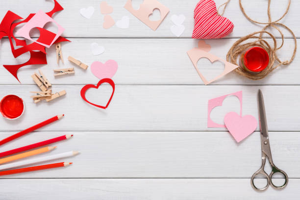 istock Valentine day handmade scrapbooking background, cut and paste hearts card 639471140