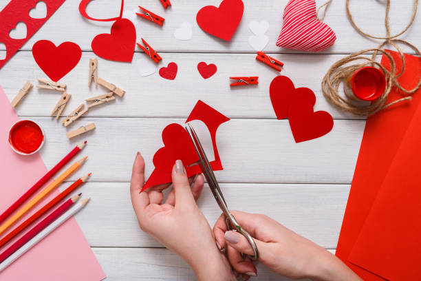 istock Valentine day handmade scrapbooking background, cut and paste hearts card 639471224
