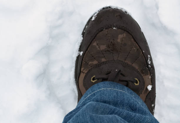 istock Shoe in snow 639471310