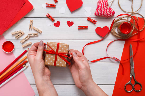 istock Valentine day handmade present background, cut and paste hearts card 639471350
