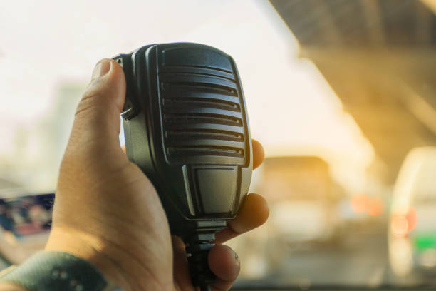 Radio communication service and emergency calls on traffic jam Radio communication service and emergency calls on traffic jam background. walkie talkie photos stock pictures, royalty-free photos & images