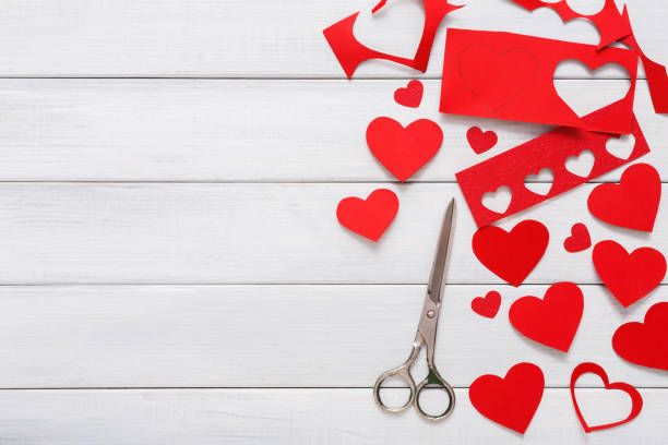 istock Valentine day handmade scrapbooking background, cut and paste hearts card 639471646