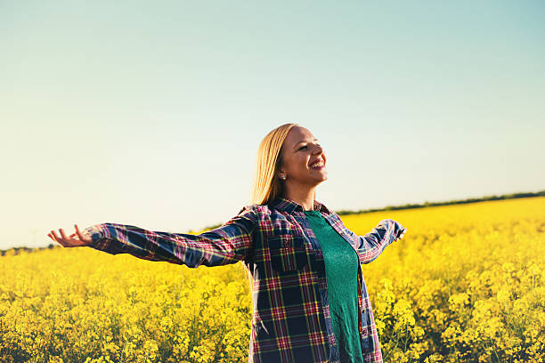 istock Cheerful woman hugging sunset in summer 639472458