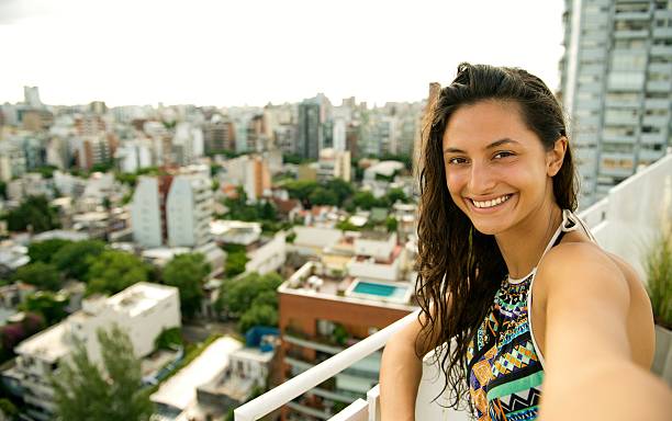 istock Beautiful woman making a selfie. 639472714