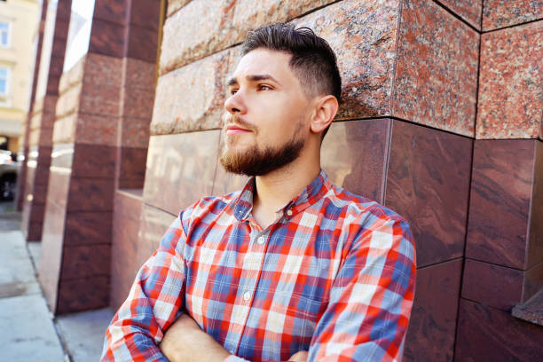 istock Handsome stylish young man with beard 639475732