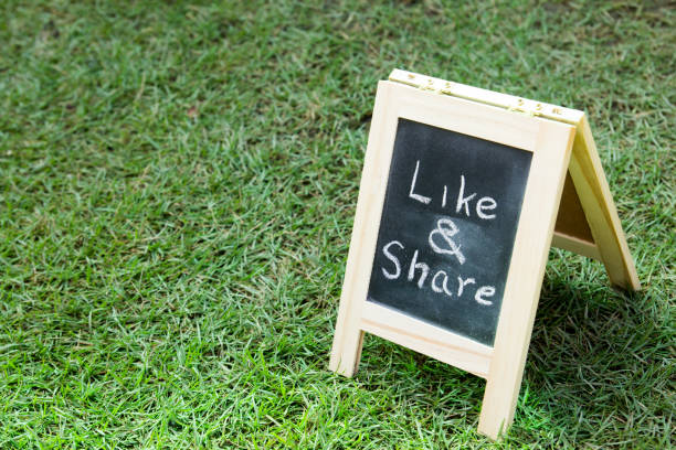 istock Blackboard with easel and wording like and share 639476134
