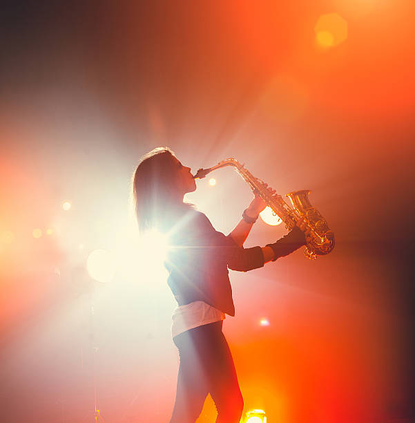 istock Female Saxophone Player 639476968