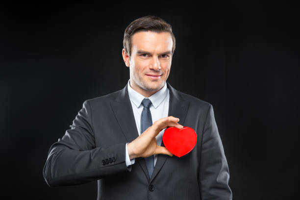 istock Man hoding toy heart 639477356