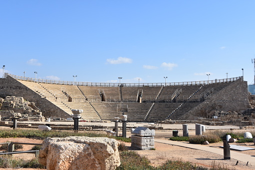 Tourists at the Famous Historical Roman amphitheater at Caesarea