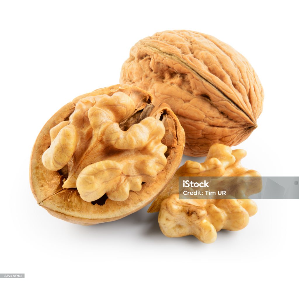 Walnuts isolated on white background. With clipping path. Nut - Food Stock Photo