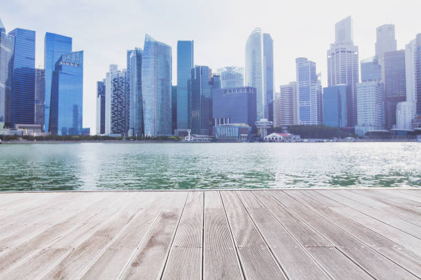istock modern cityscape skyline and empty wooden floor 639484480
