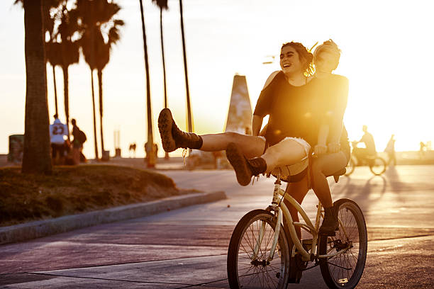 istock Women Couple Biking 639484612
