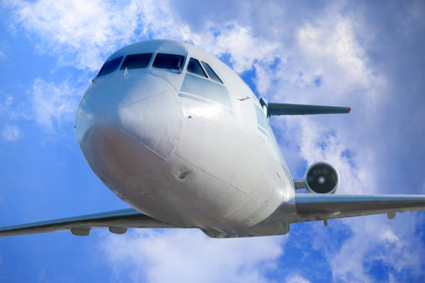 istock passenger plane in the blue sky 639485094