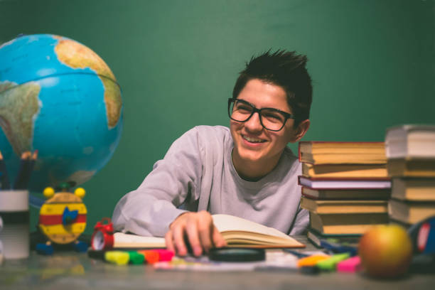 istock Male Student Working At Desk 639485300