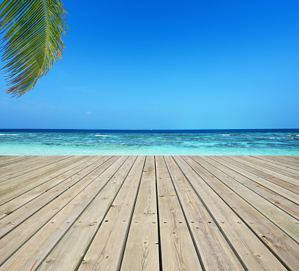 Wooden terrace and tropical seascape