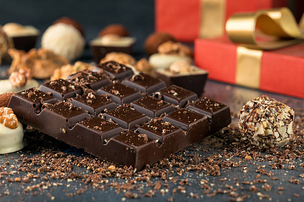 istock Whole chocolate bar with chocolate candies and gift box 639487160