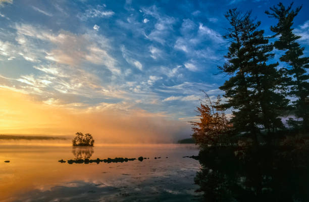 istock Sunrise on Maine lake 639488628