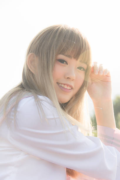 istock high school girl on sea side 639488730