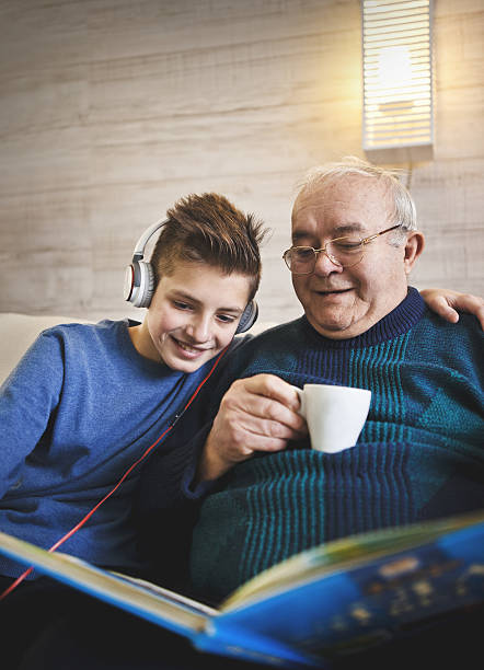 istock Sharing memories of his youth 639489130