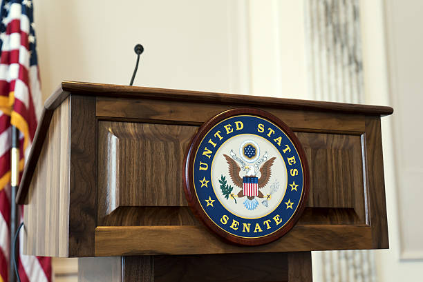 United States Senate Podium at Capitol Hill Washington D.C, USA – January 18, 2017: The United States Senate podium in the Washington D.C. capitol building also known as Capitol Hill.  The podium is where U.S. senators speak about upcoming bills and hearings, but the podium is empty because congress is not in session due to the inauguration of Donald J Trump for US president. senate photos stock pictures, royalty-free photos & images