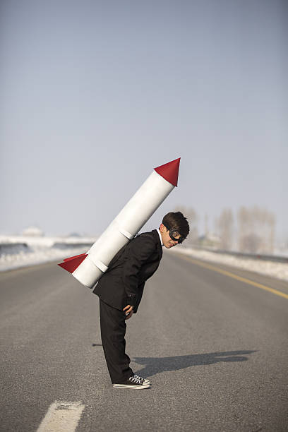 istock Young Business Boy Wearing Rocket 639495106