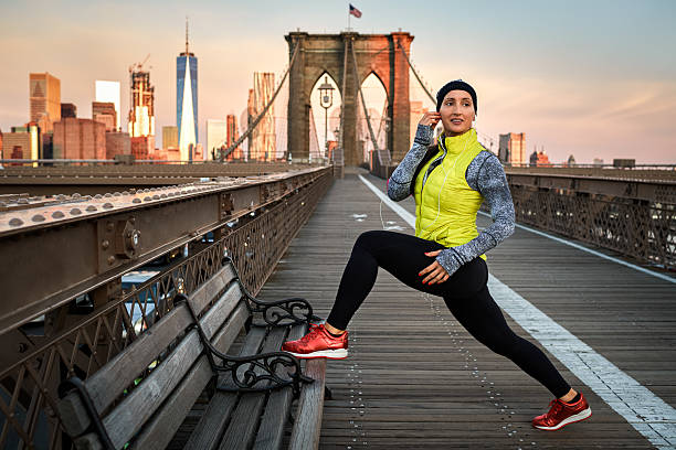 istock Female athlete stretching on the bench 639496072