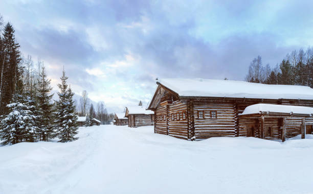 Old Village Log Houses in museum Small Karelians near Arkhangelsk stock photo
