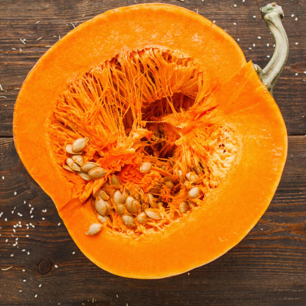 istock Round orange pumpkin half in cut 639496494