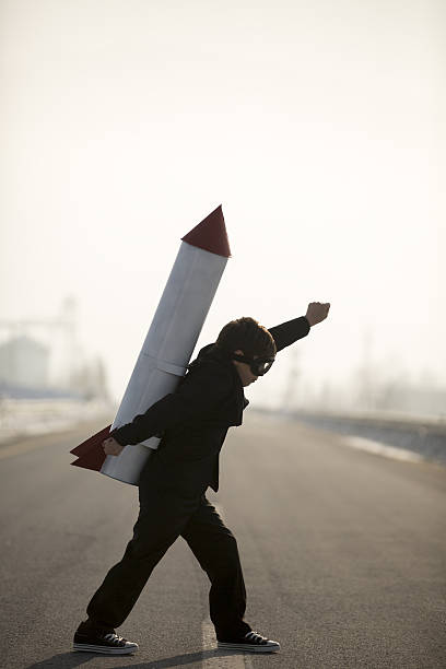 istock Young Business Boy Wearing Rocket 639497060