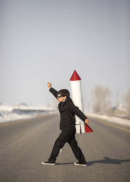 istock Young Business Boy Wearing Rocket 639497366