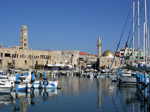 Akko, Israel - November 15, 2003: Fishing harbor and Old City of Akko (Acre)