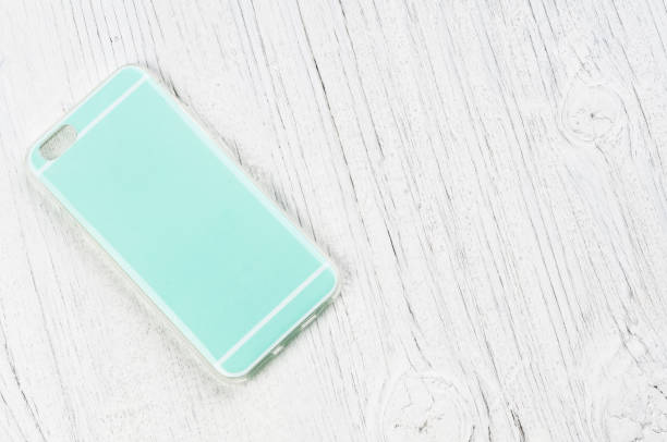 istock Cover for smart phone on rustik wooden background 639503390