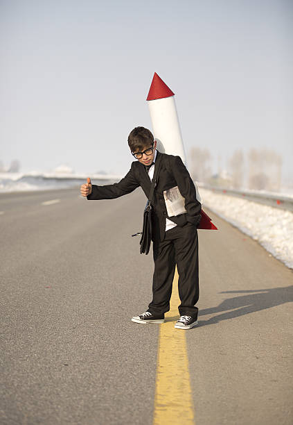 istock Young Business Boy Wearing Rocket 639504572